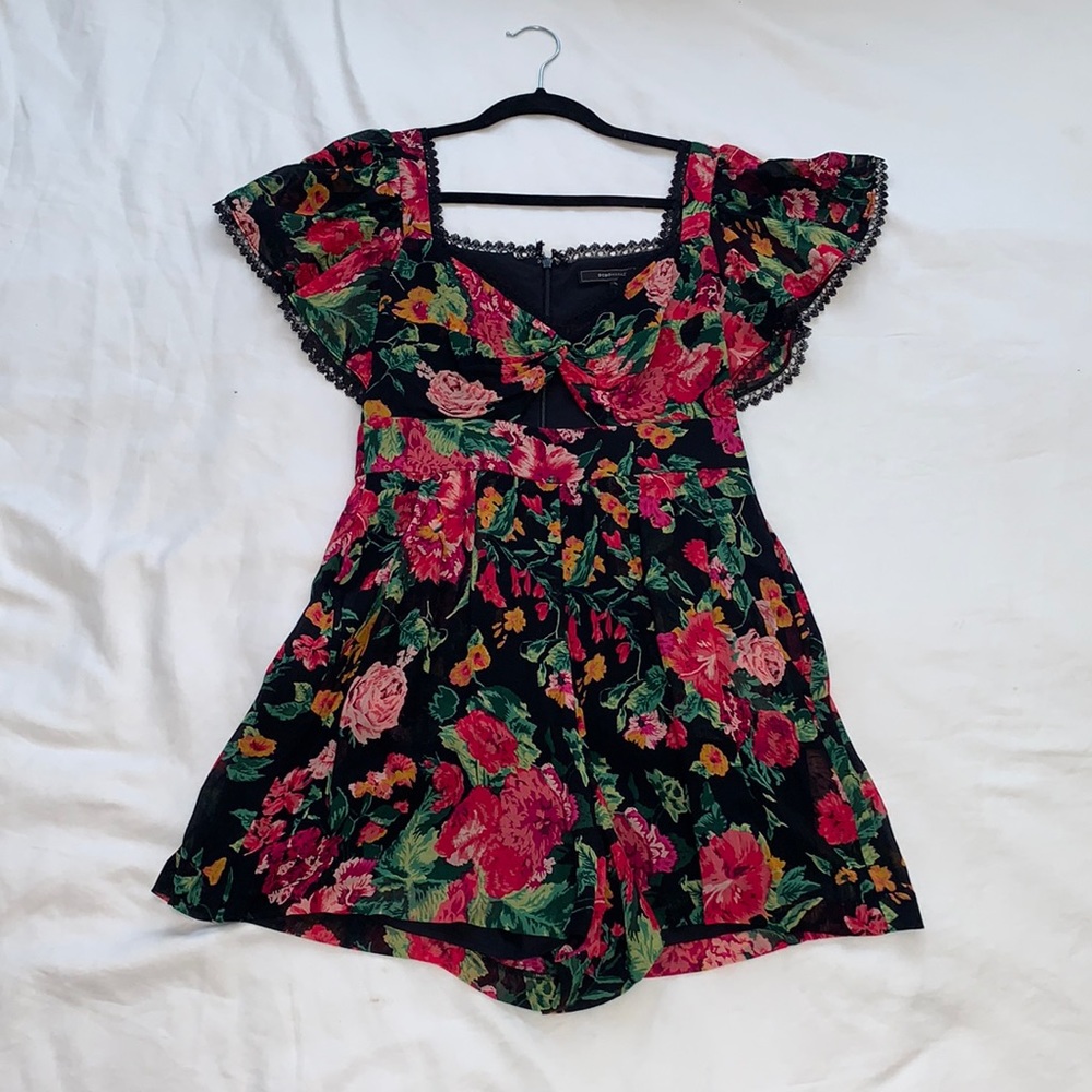 BCBG XS CUTOUT ROMPER WITH BACK ZIP.  WORN ONCE!